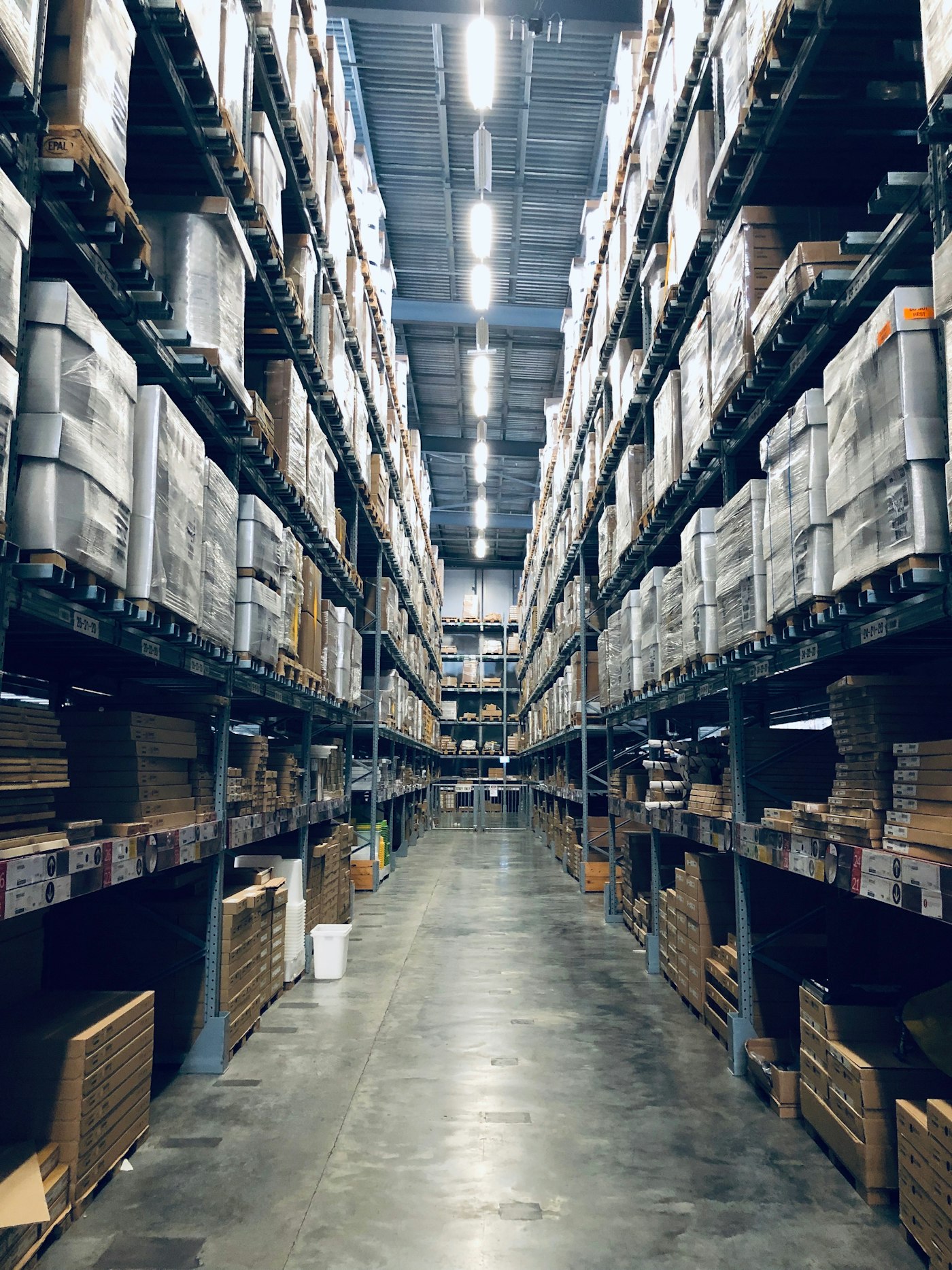 Warehouse aisle of palletized packaged goods